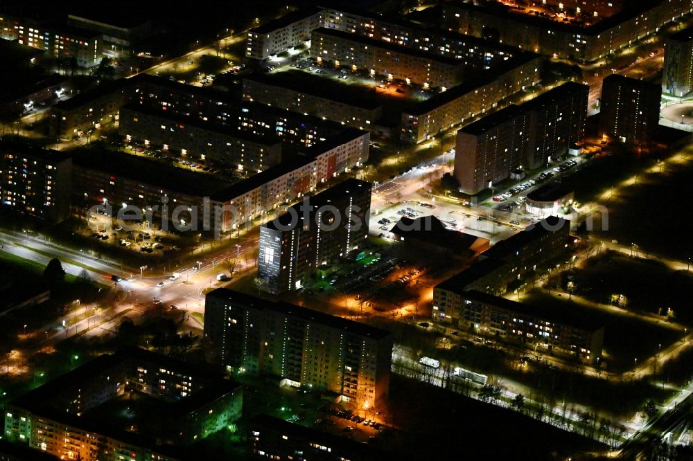 Schwerin at night from above - Night lighting skyscrapers in the residential area of industrially manufactured settlement Grosser Dreesch in the district Zippendorf in Schwerin in the state Mecklenburg - Western Pomerania, Germany
