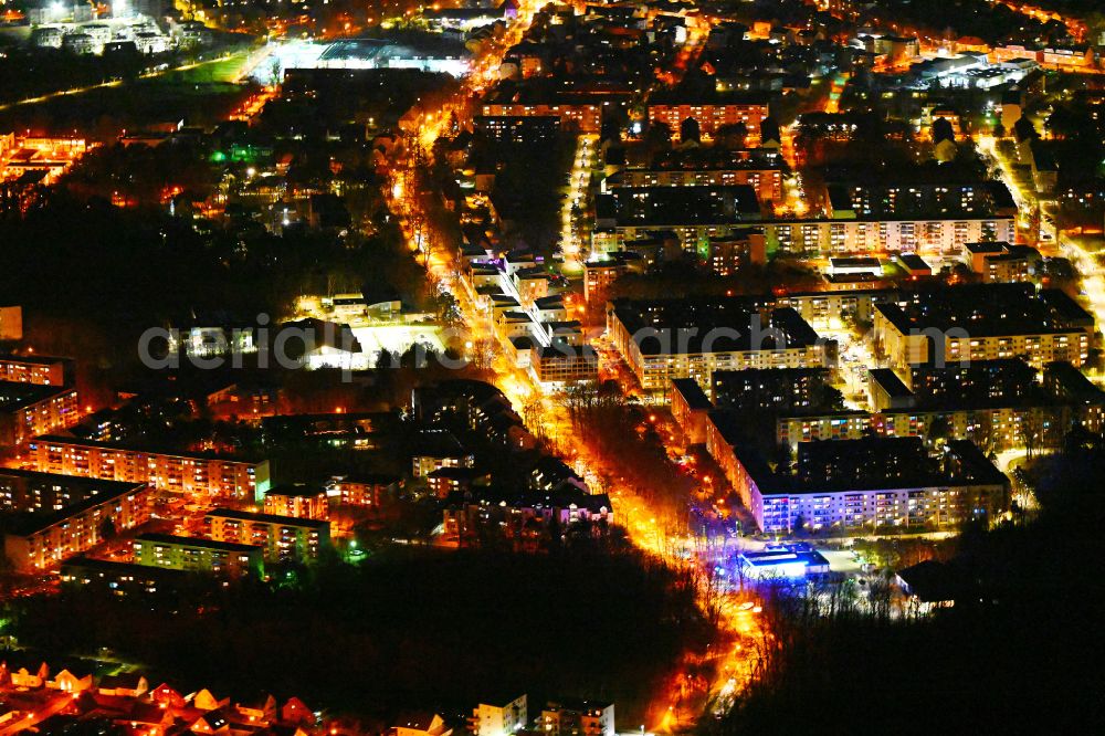 Aerial image at night Königs Wusterhausen - Night lighting residential area of industrially manufactured settlement on street Luckenwalder Strasse in Koenigs Wusterhausen in the state Brandenburg, Germany