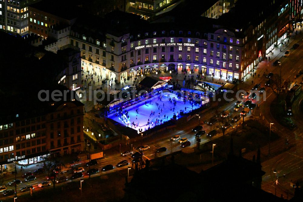 Aerial image at night München - Night lighting ensemble space an place Karlsplatz - Stachus in the inner city center in Munich in the state Bavaria, Germany