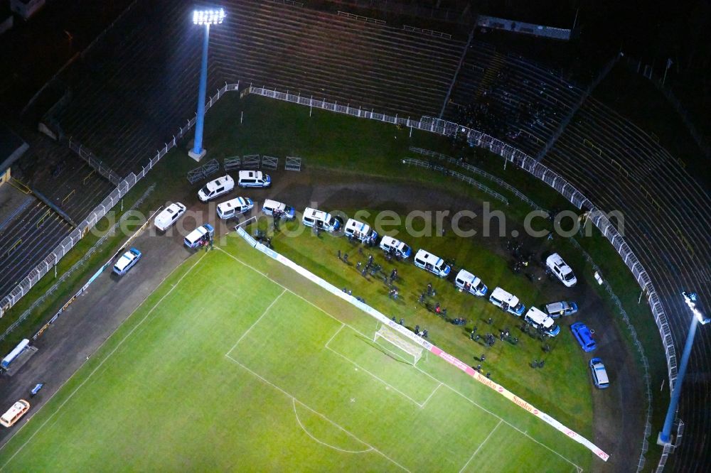 Leipzig at night from above - Night lighting Police trainingmission in the Football stadium Bruno-Plache-Stadion on Connewitzer Strasse in the district Suedost in Leipzig in the state Saxony, Germany