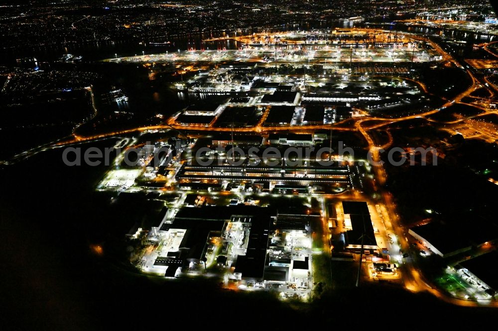 Aerial image at night Hamburg - Night lighting building and production halls on the premises of TRIMET Aluminium SE on Aluminiumstrasse in the district Altenwerder in Hamburg, Germany