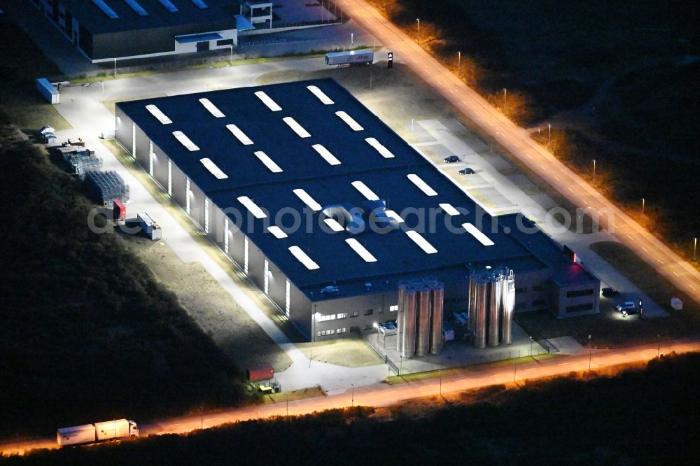 Schwerin at night from the bird perspective: Night lighting production site of Procap in the Industrial Park Schwerin on street Ludwig-Boelkow-Strasse in Schwerin in the state of Mecklenburg - Western Pomerania