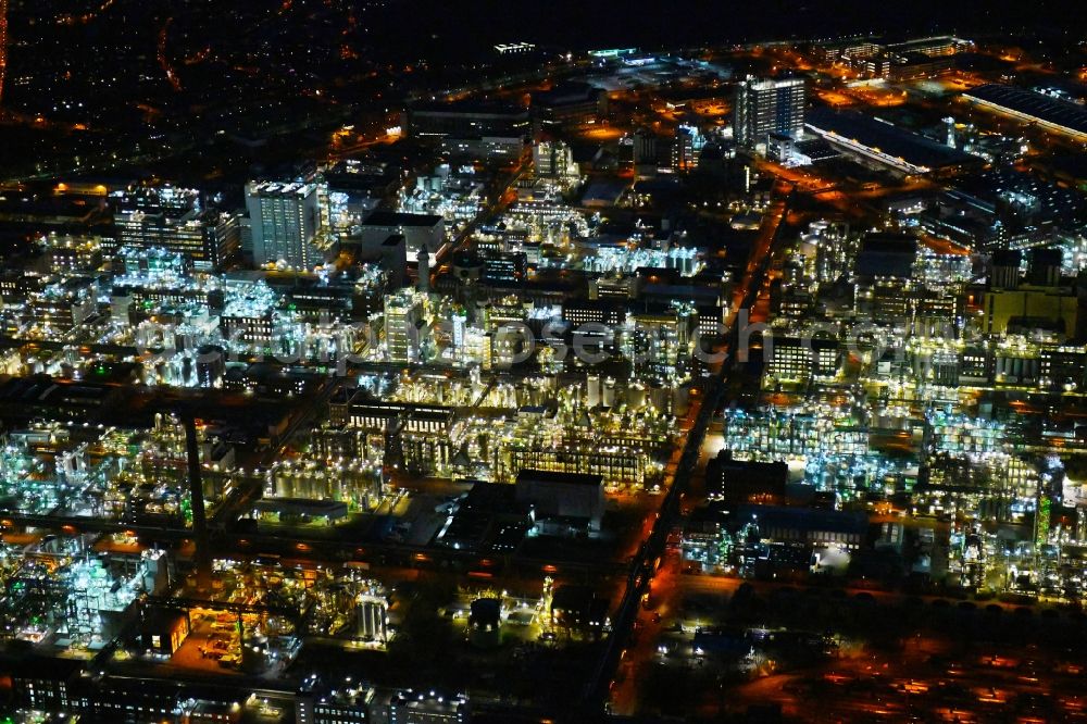 Aerial photograph at night Ludwigshafen am Rhein - Night lighting refinery equipment and management systems on the factory premises of the chemical manufacturers BASF in Ludwigshafen am Rhein in the state Rhineland-Palatinate, Germany