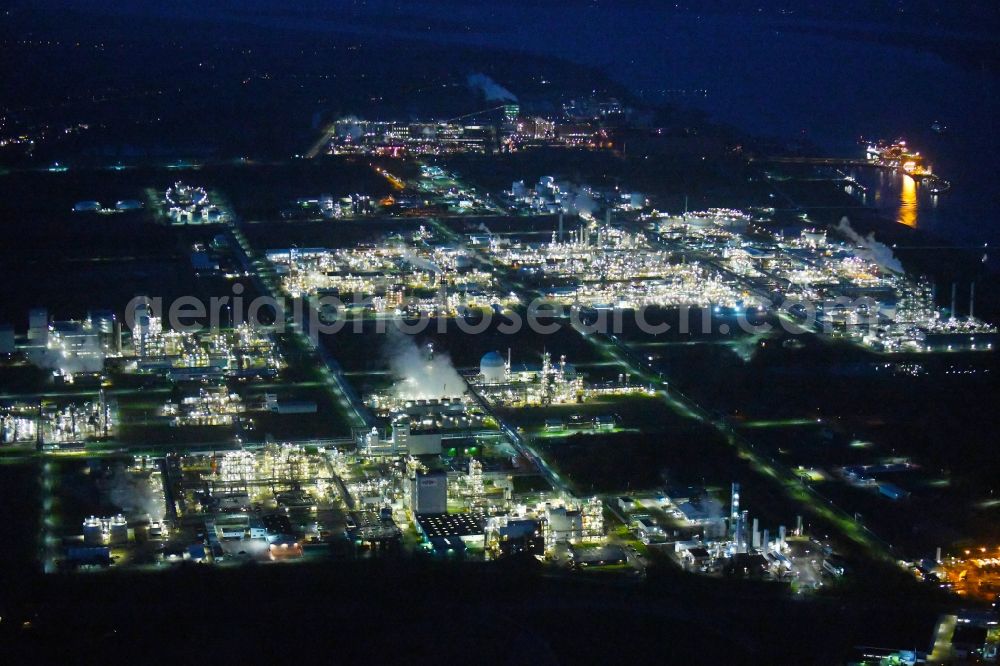 Stade at night from above - Night lighting refinery equipment and management systems on the factory premises of the chemical manufacturers of Fa. Dow Chemical Olin in Stade in the state Lower Saxony, Germany
