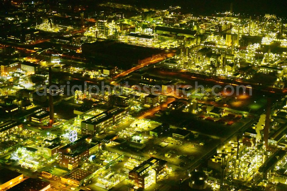 Köln at night from above - Night lighting refinery equipment and management systems on the factory premises of the mineral oil manufacturers CHEMPARK Dormagen Tor entlang of Parallelweg in the district Chorweiler in Cologne in the state North Rhine-Westphalia, Germany