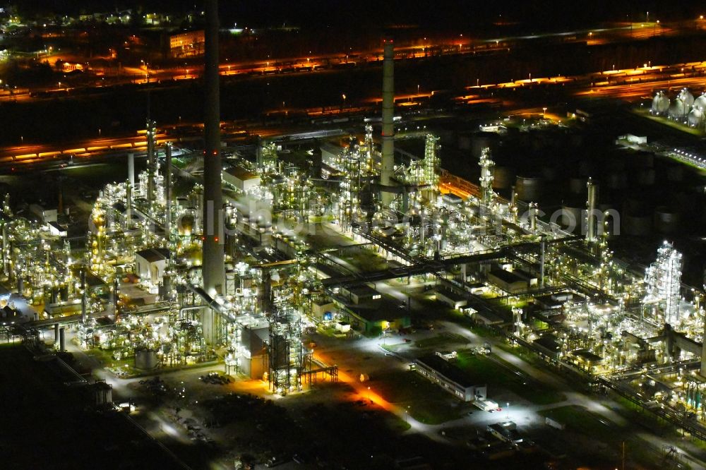 Aerial image at night Karlsruhe - Night lighting refinery equipment and management systems on the factory premises of the mineral oil manufacturers Mineraloelraffinerie Oberrhein in the district Knielingen in Karlsruhe in the state Baden-Wurttemberg, Germany