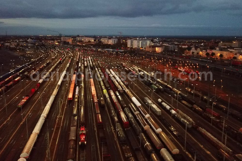 Halle (Saale) at night from the bird perspective: Night lighting marshalling yard and freight station of the Deutsche Bahn in Halle (Saale) in the state Saxony-Anhalt, Germany