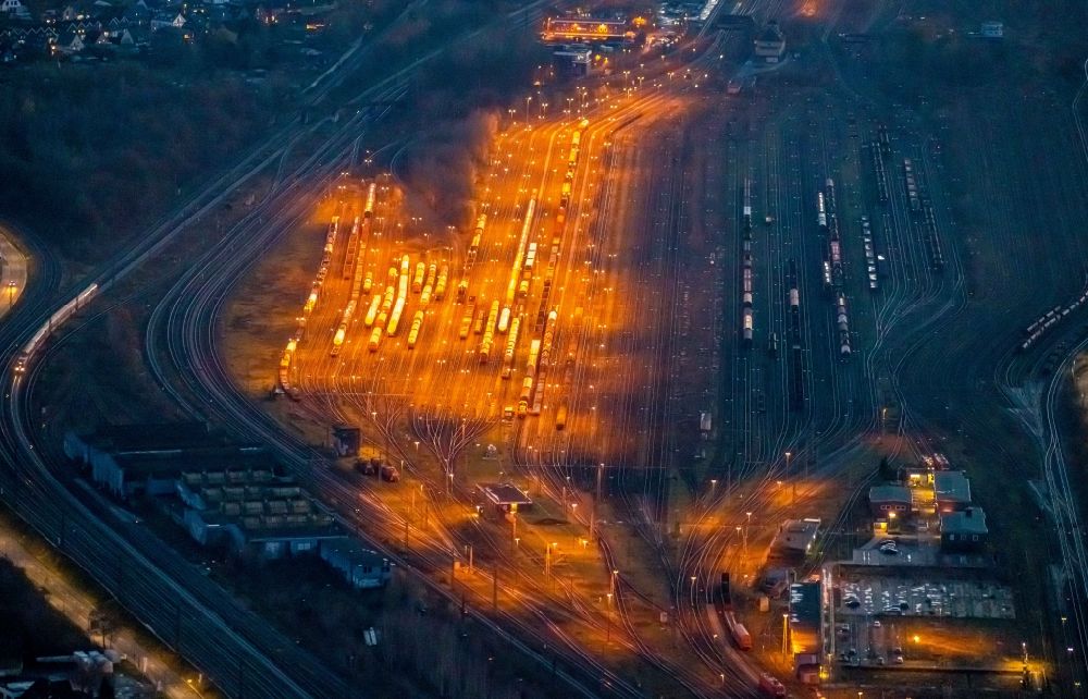 Hamm at night from the bird perspective: Night lighting marshalling yard and freight station of the Deutsche Bahn in Hamm in the state North Rhine-Westphalia, Germany