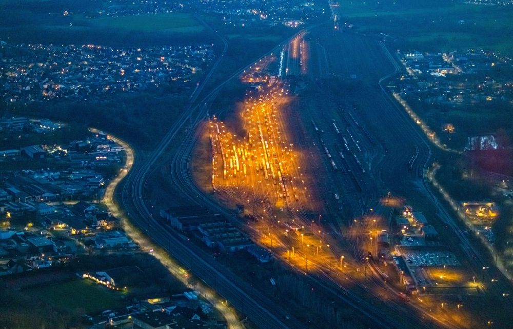 Aerial photograph at night Hamm - Night lighting marshalling yard and freight station of the Deutsche Bahn in Hamm in the state North Rhine-Westphalia, Germany