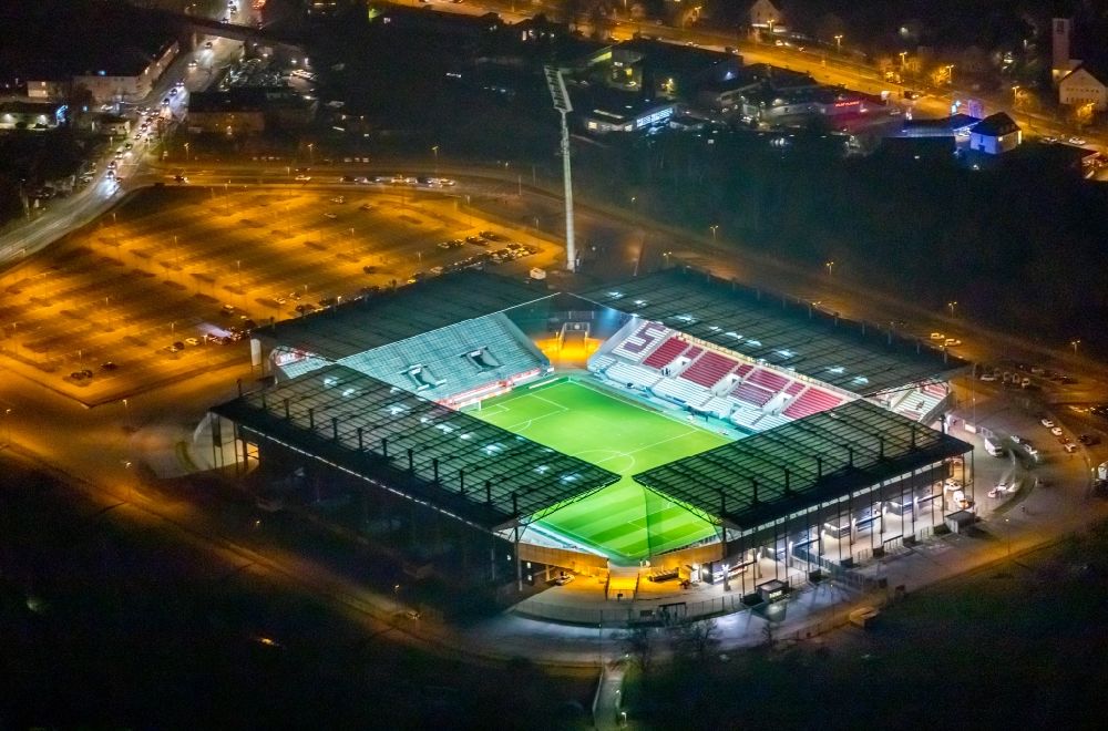 Aerial image at night Essen - Night lighting rWE - Red-White Stadium in Essen in North Rhine-Westphalia