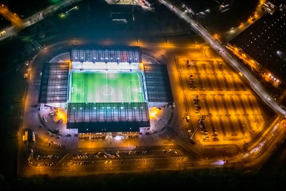 Aerial photograph at night Essen - Night lighting rWE - Red-White Stadium in Essen in North Rhine-Westphalia
