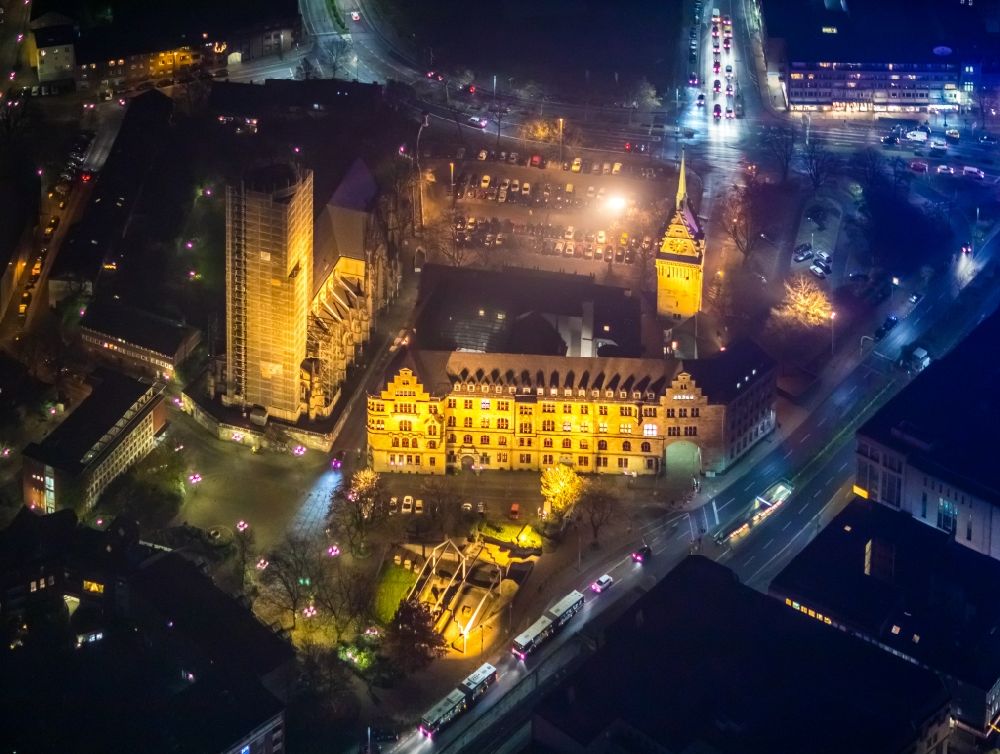 Aerial photograph at night Duisburg - Night lighting town Salvator church and Hall building of the city administration in Duisburg in the state North Rhine-Westphalia, Germany