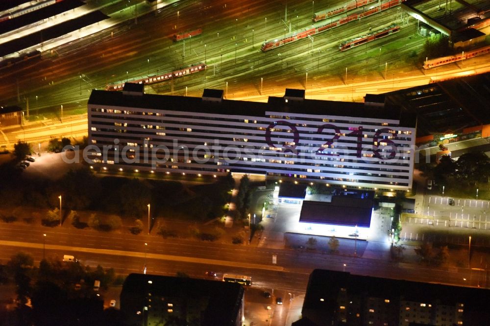 Aerial photograph at night Berlin - Night view reorganized and modernized DDR block as students and single-residence Q 216 at Lichtenberg station in Berlin
