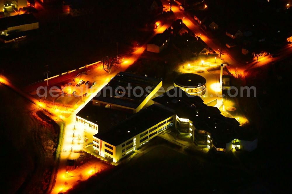 Aerial photograph at night Mühlenbecker Land - Night lighting school building of the Kaethe-Kollwitz-Gesamtschule in the district Muehlenbeck in Muehlenbecker Land in the state Brandenburg, Germany