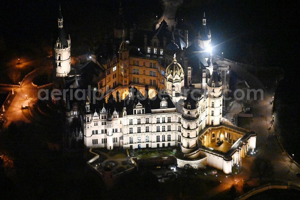 Schwerin at night from the bird perspective: Night lighting schwerin Castle in the state capital of Mecklenburg-Western Pomerania