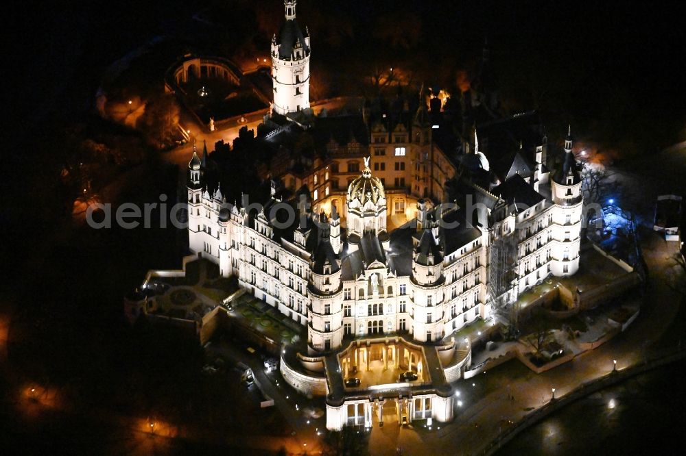 Aerial image at night Schwerin - Night lighting schwerin Castle in the state capital of Mecklenburg-Western Pomerania
