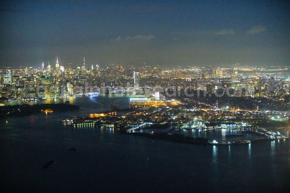 Aerial image at night New York - Night lighting Settlement area in the district Brooklyn in New York in United States of America