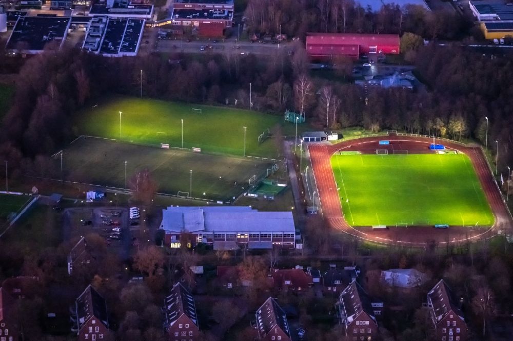 Aerial image at night Stade - Night lighting sports grounds and football pitch VFL Stade Gueldenstern in Ottenbeck in the state Lower Saxony, Germany