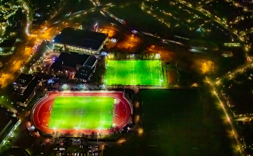 Bochum at night from the bird perspective: Night lighting ensemble of sport ground on the site of VfL Bochum 1848 Fussballgemeinschaft e. V. Am Stadion in Bochum in the state North Rhine-Westphalia, Germany