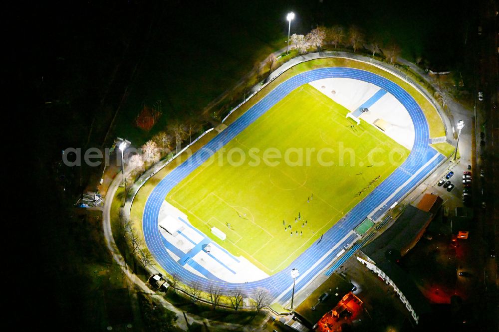 Aerial photograph at night Berlin - Night lighting sports facility grounds of stadium Lichterfelde in Berlin, Germany