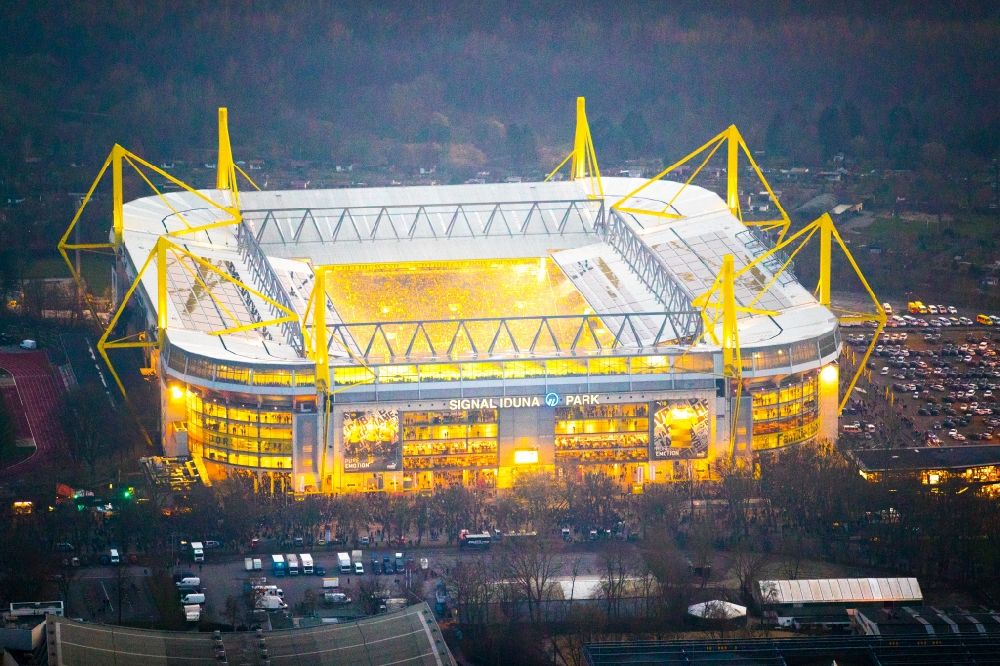 Aerial image at night Dortmund - Night lighting Sports facility grounds of the Arena stadium in Dortmund in the state North Rhine-Westphalia