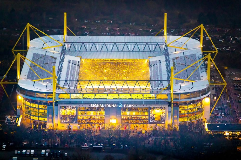 Aerial image at night Dortmund - Night lighting Sports facility grounds of the Arena stadium in Dortmund in the state North Rhine-Westphalia
