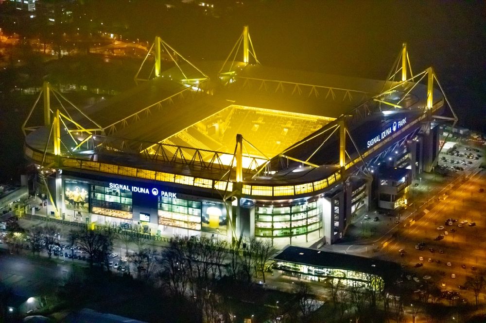 Aerial image at night Dortmund - Night lighting sports facility grounds of the Arena stadium in Dortmund in the state North Rhine-Westphalia