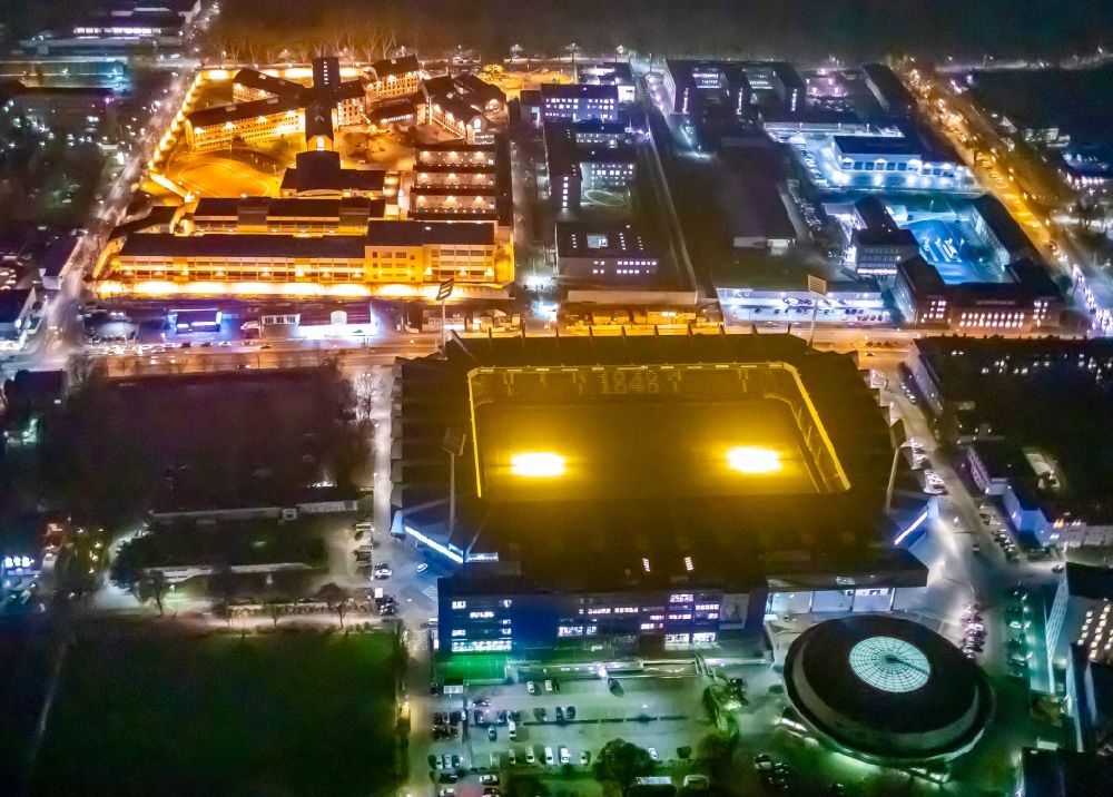 Dortmund at night from above - Night lighting sports facility grounds of the Arena stadium in Dortmund in the state North Rhine-Westphalia