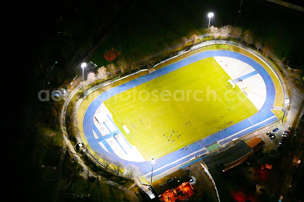 Aerial image at night Berlin - Night lighting sports facility grounds of stadium Lichterfelde in Berlin, Germany
