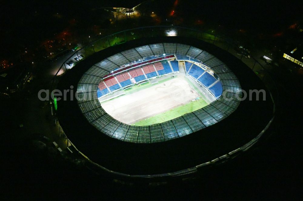 Aerial image at night Hannover - Night lighting HDI Arena stadium in Calenberger Neustadt district of Hanover, in Lower Saxony