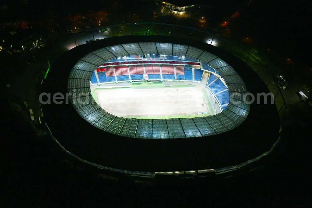 Hannover at night from above - Night lighting HDI Arena stadium in Calenberger Neustadt district of Hanover, in Lower Saxony