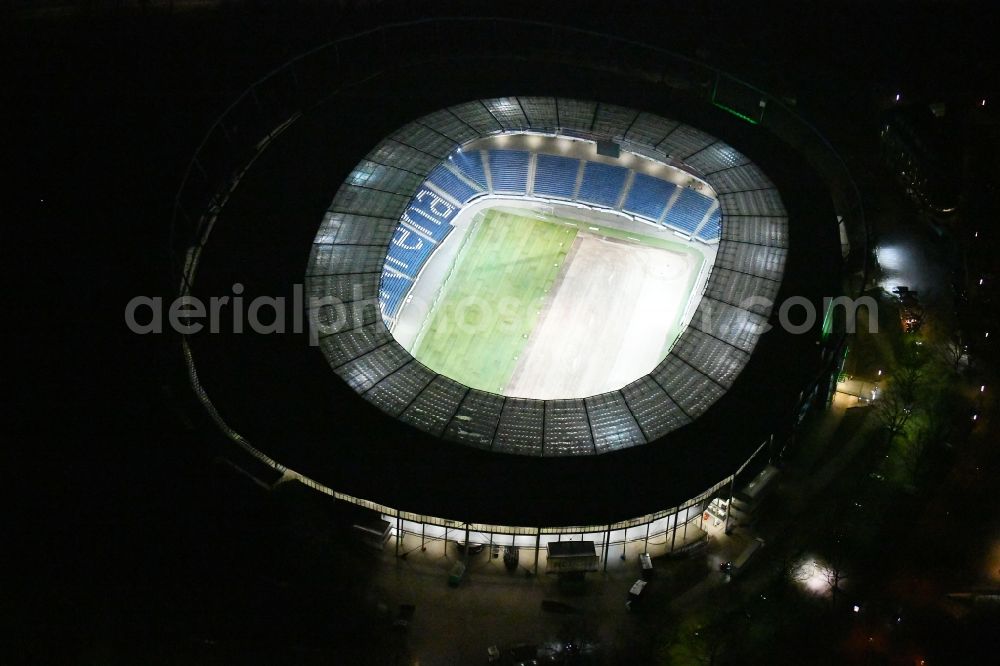 Hannover at night from above - Night lighting HDI Arena stadium in Calenberger Neustadt district of Hanover, in Lower Saxony