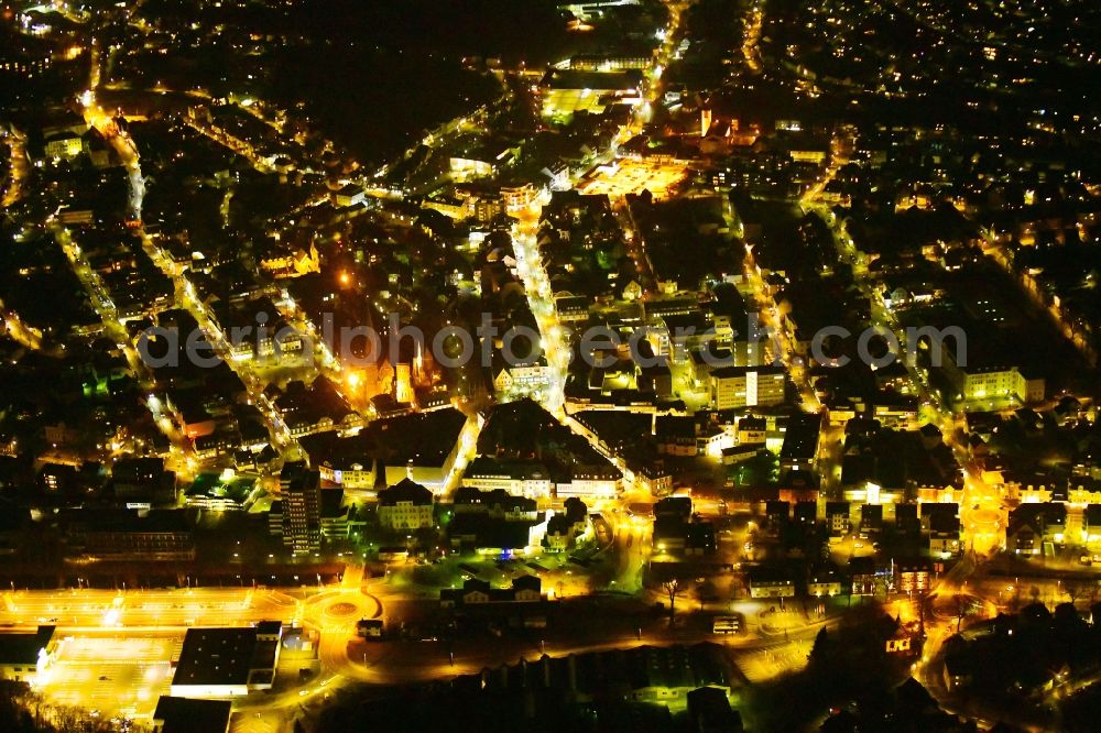 Olpe at night from the bird perspective: Night lighting city view on down town in Olpe in the state North Rhine-Westphalia, Germany