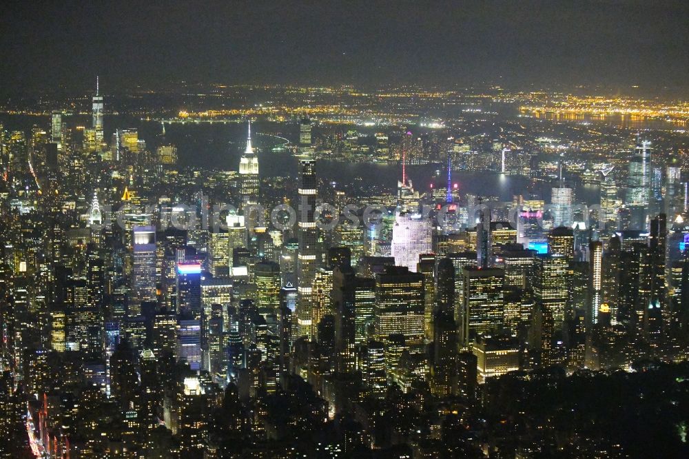 New York at night from above - Night lighting City view of the city area of in the district Manhattan in New York in United States of America
