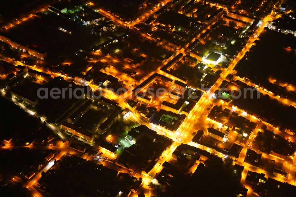 Aerial photograph at night Seelow - Night lighting City view of downtown area in Seelow in the state Brandenburg, Germany