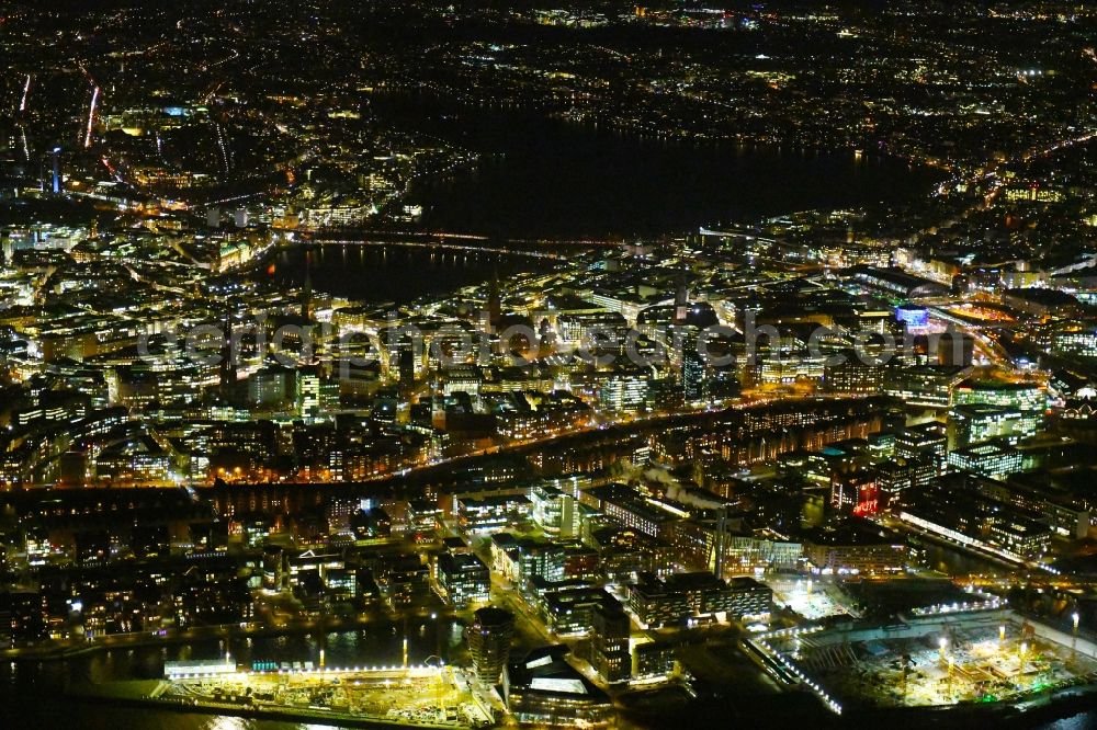Hamburg at night from above - Night lighting city view on the river bank of the River Elbe in the district HafenCity in Hamburg, Germany