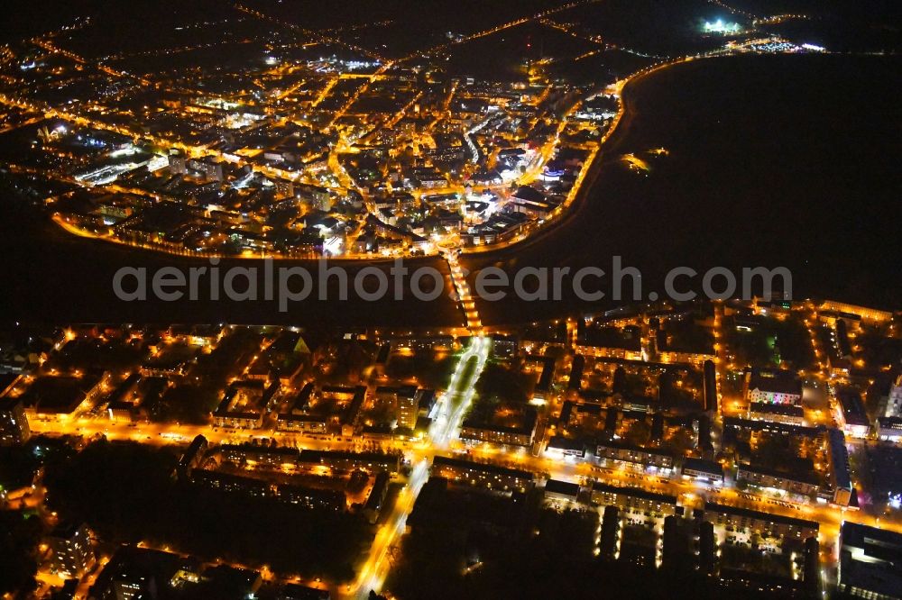 Aerial photograph at night Slubice - Night lighting City view on the river bank of Oder in Slubice in lubuskie, Poland