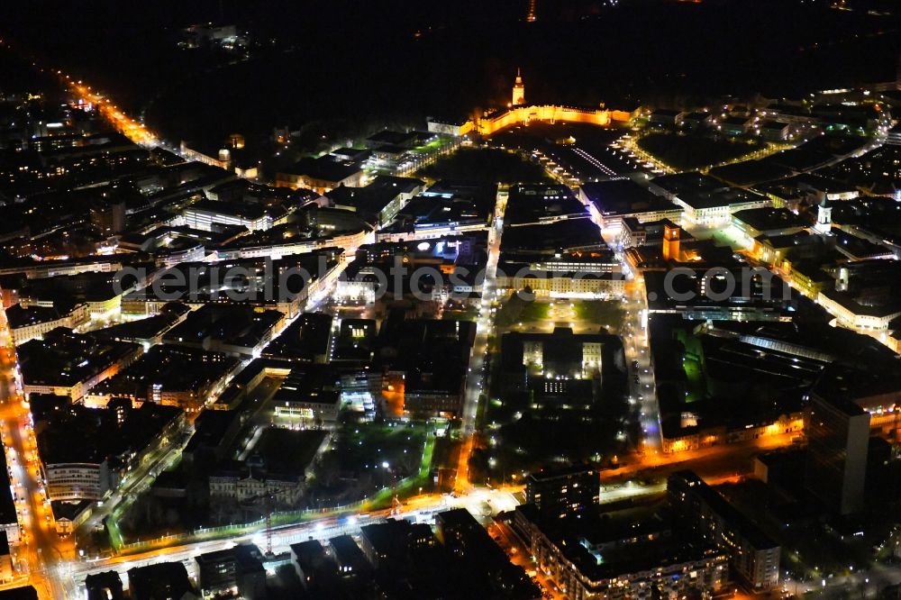 Aerial photograph at night Karlsruhe - Night lighting district overlooking the Schloss Karlsruhe between Reinhold-Frank-Strasse and Kriegsstrasse in the city in the district Innenstadt-West in Karlsruhe in the state Baden-Wurttemberg, Germany