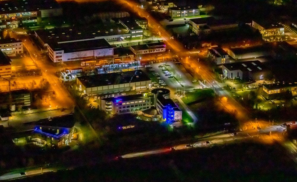 Aerial photograph at night Unna - Night lighting office building on Heinrich-Hertz-Strasse in the district Industriepark Unna in Unna in the state North Rhine-Westphalia, Germany