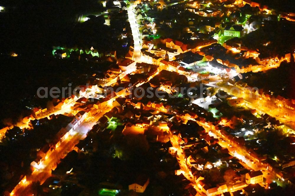 Ballenstedt at night from the bird perspective: Night lighting the city center in the downtown area in Ballenstedt in the state Saxony-Anhalt, Germany