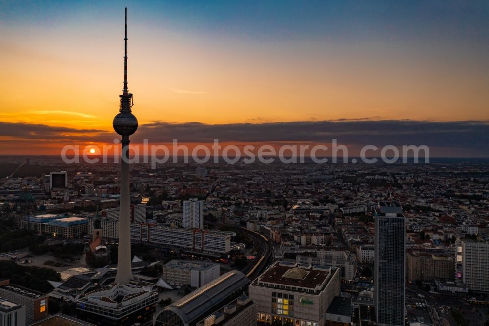 Aerial photograph at night Berlin - Night lighting The city center in the downtown area on tv- tower - Alexanderplatz in the district Mitte in Berlin, Germany
