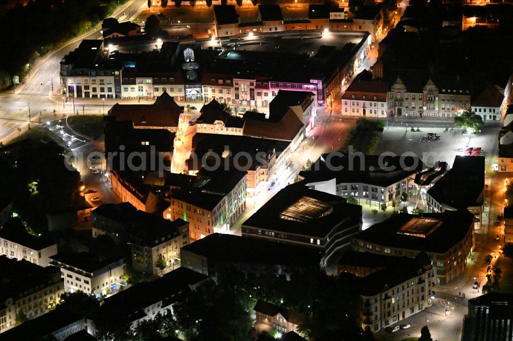 Aerial image at night Eberswalde - Night lighting the city center in the downtown area on street Am Markt in Eberswalde in the state Brandenburg, Germany