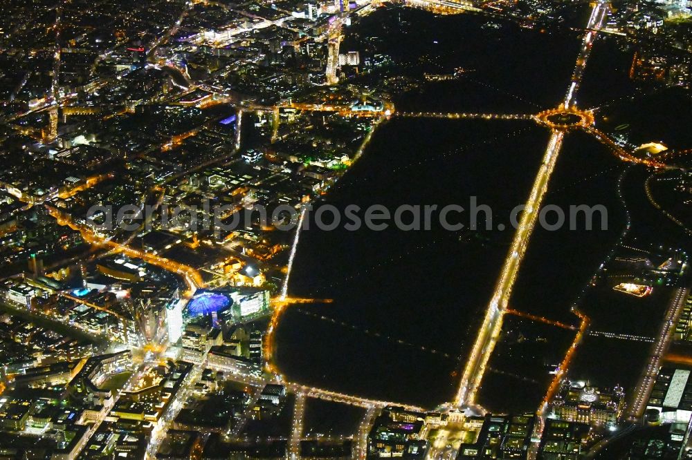 Aerial photograph at night Berlin - Night lighting The city center in the downtown area with Leipziger and Potsdamer Platz, parc garden Tiergarten, Strasse of 17.Juni, Gate Brandenburger Tor and place Pariser Platz in the district Mitte in Berlin, Germany
