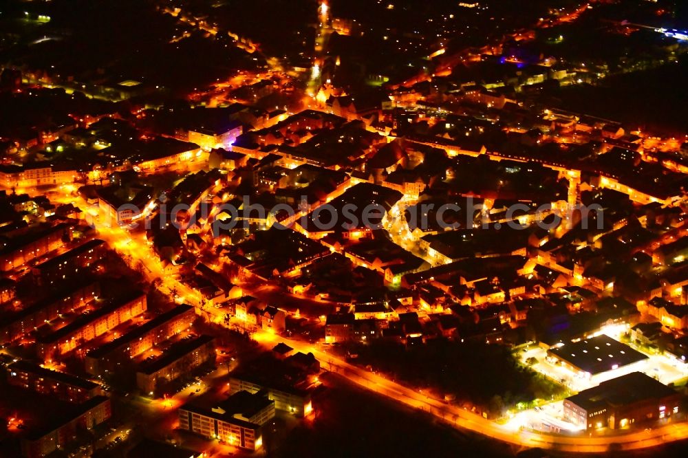Aerial photograph at night Nauen - Night lighting the city center in the downtown area in Nauen in the state Brandenburg, Germany