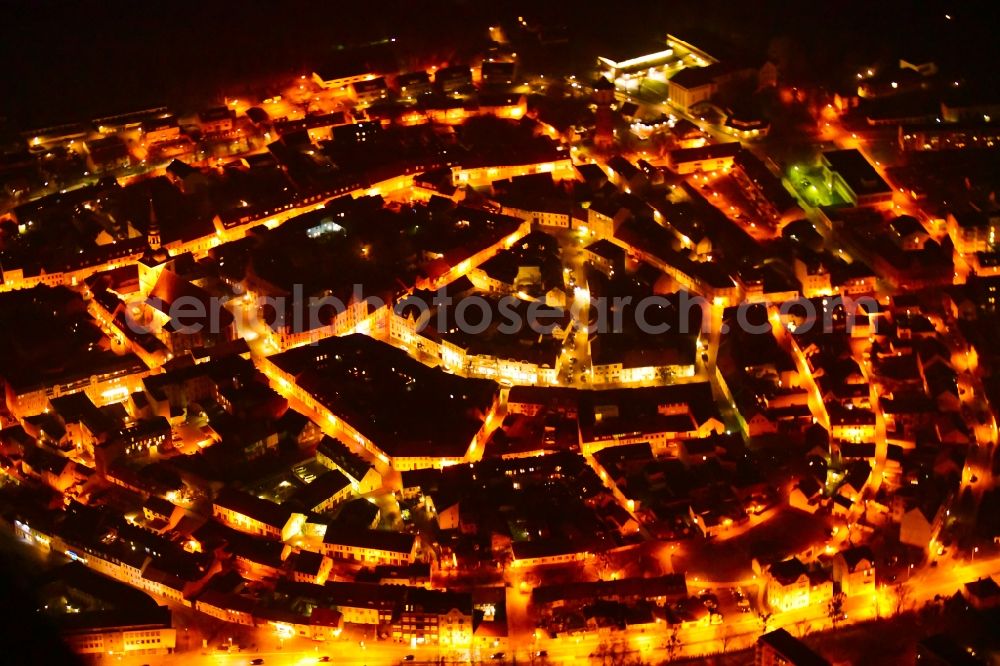 Nauen at night from above - Night lighting the city center in the downtown area in Nauen in the state Brandenburg, Germany