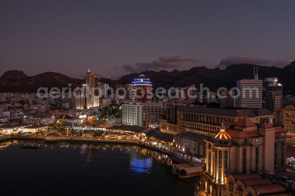 Aerial photograph at night Port Louis - Night lighting city center in the city center on the beach shore Port Louis Waterfront in Port Louis in Port Louis District, Mauritius