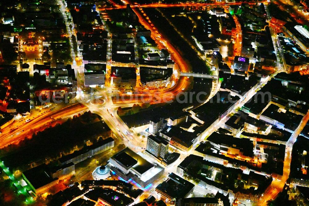 Saarbrücken at night from the bird perspective: Night lighting city center in the downtown area on the banks of river course of the river Saar in the district Sankt Johann in Saarbruecken in the state Saarland, Germany