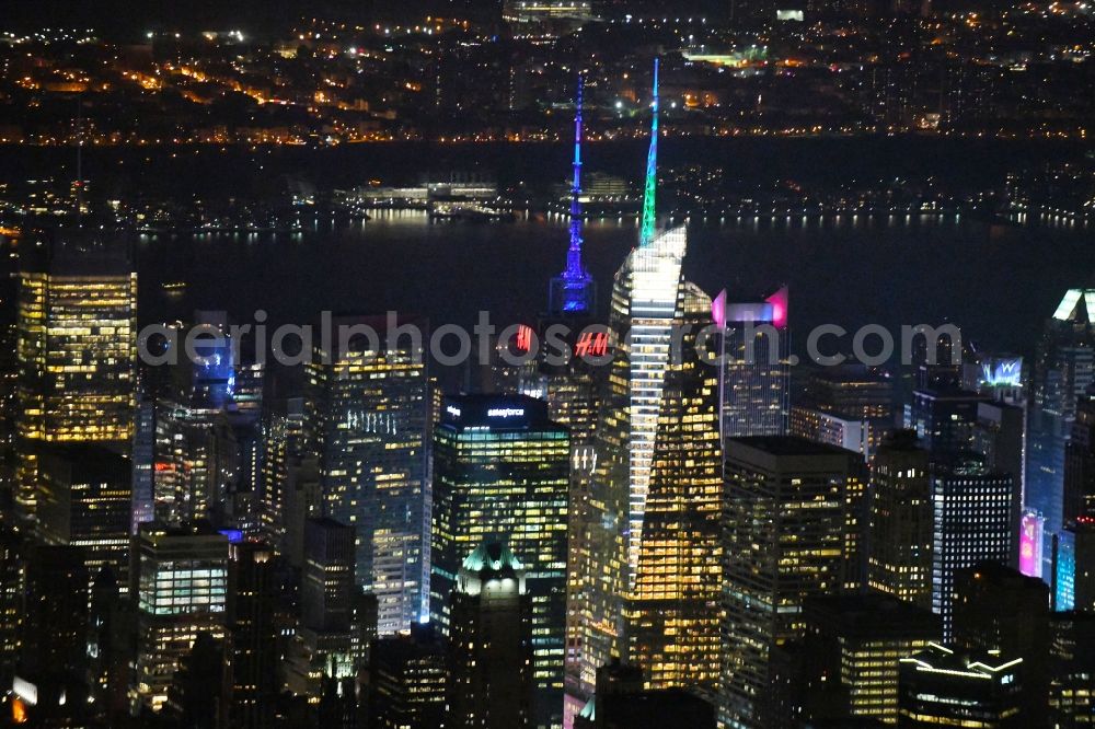 New York at night from the bird perspective: Night lighting City center with the skyline in the downtown area on 12th Ave in the district Manhattan in New York in United States of America