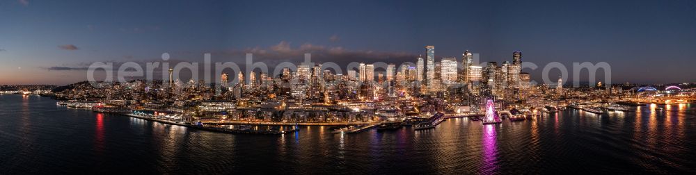 Aerial image at night Seattle - Night lighting city center with the skyline in the downtown area in Seattle in Washington, United States of America