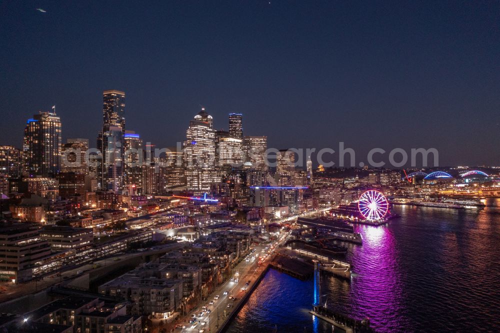Aerial photograph at night Seattle - Night lighting city center with the skyline in the downtown area in Seattle in Washington, United States of America